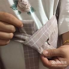 风衣的腰带背后打结
